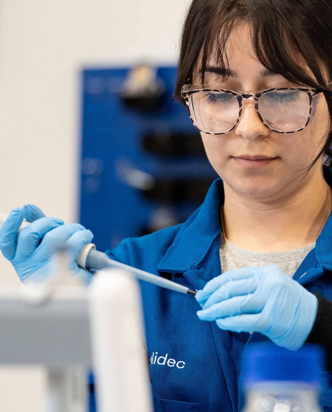 Greentown member pipetting in a lab