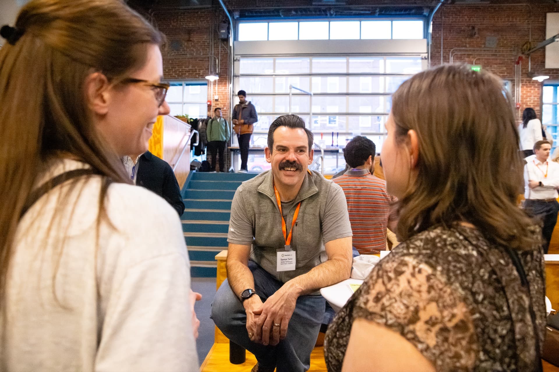 Ecosystem members connecting in conversation at Greentown Boston