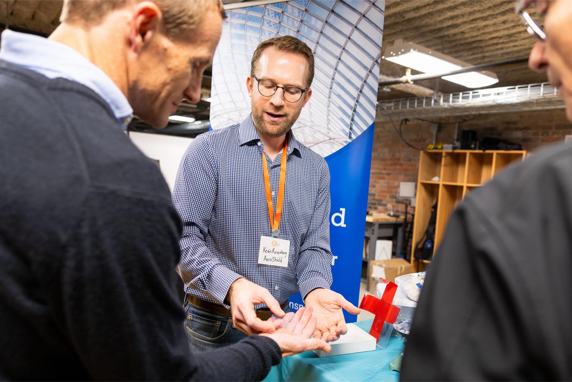 A founder demoing their product to attendees at the Climatetech Summit