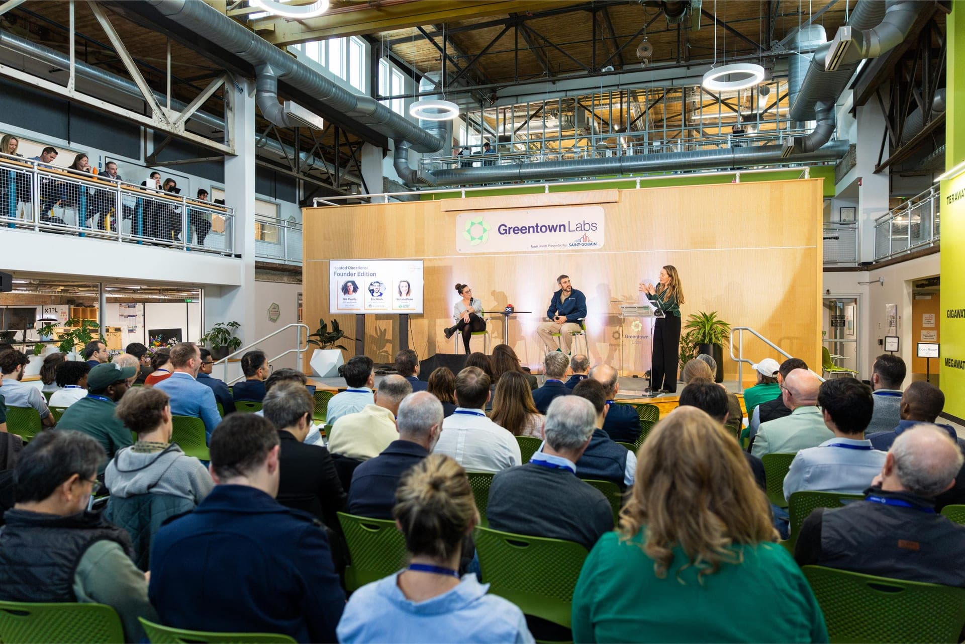 Panel discussion on stage at Greentown Labs during the Climatetech Summit